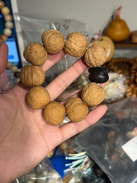 Iron Walnut Bracelet with Hand-Carved Ebony Bear (26mm Beads)